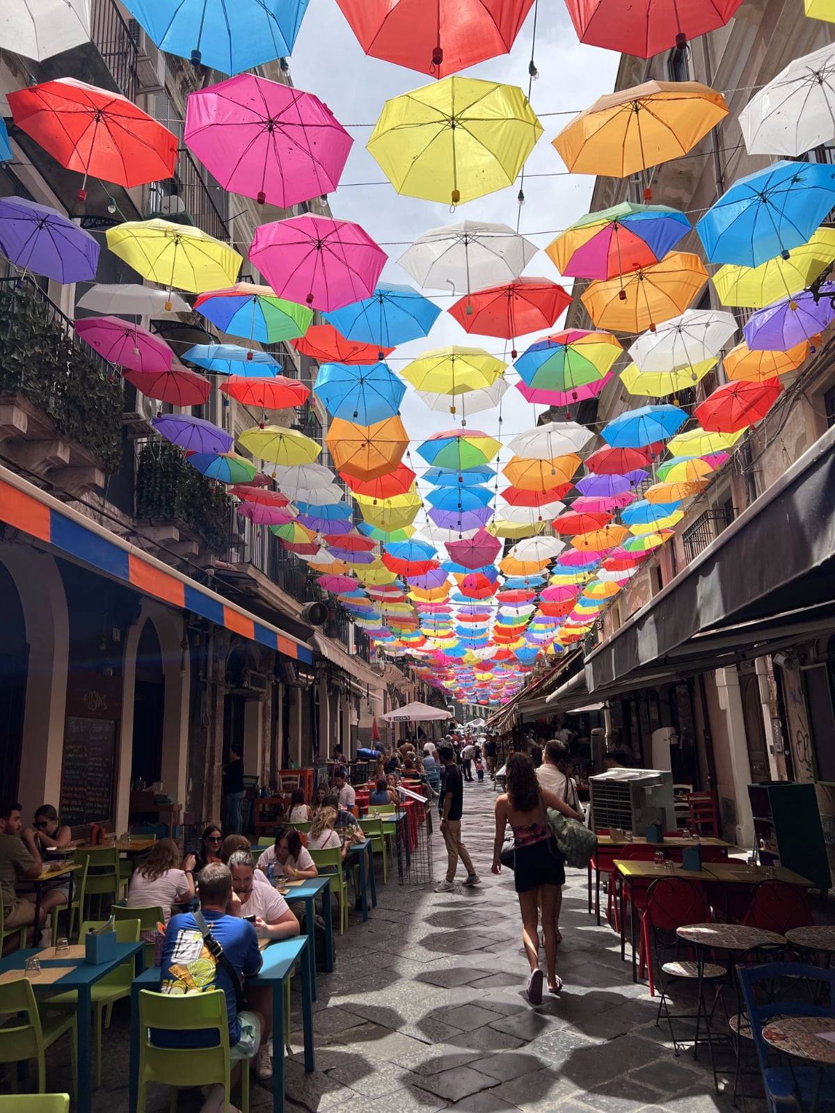 Catania street with umbrellas - via Pardo